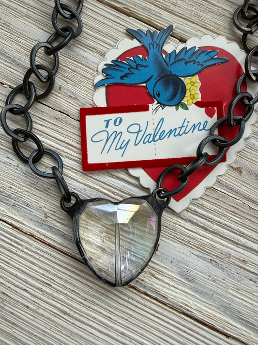 Prism crystal heart on gunmetal base metal chain necklace.