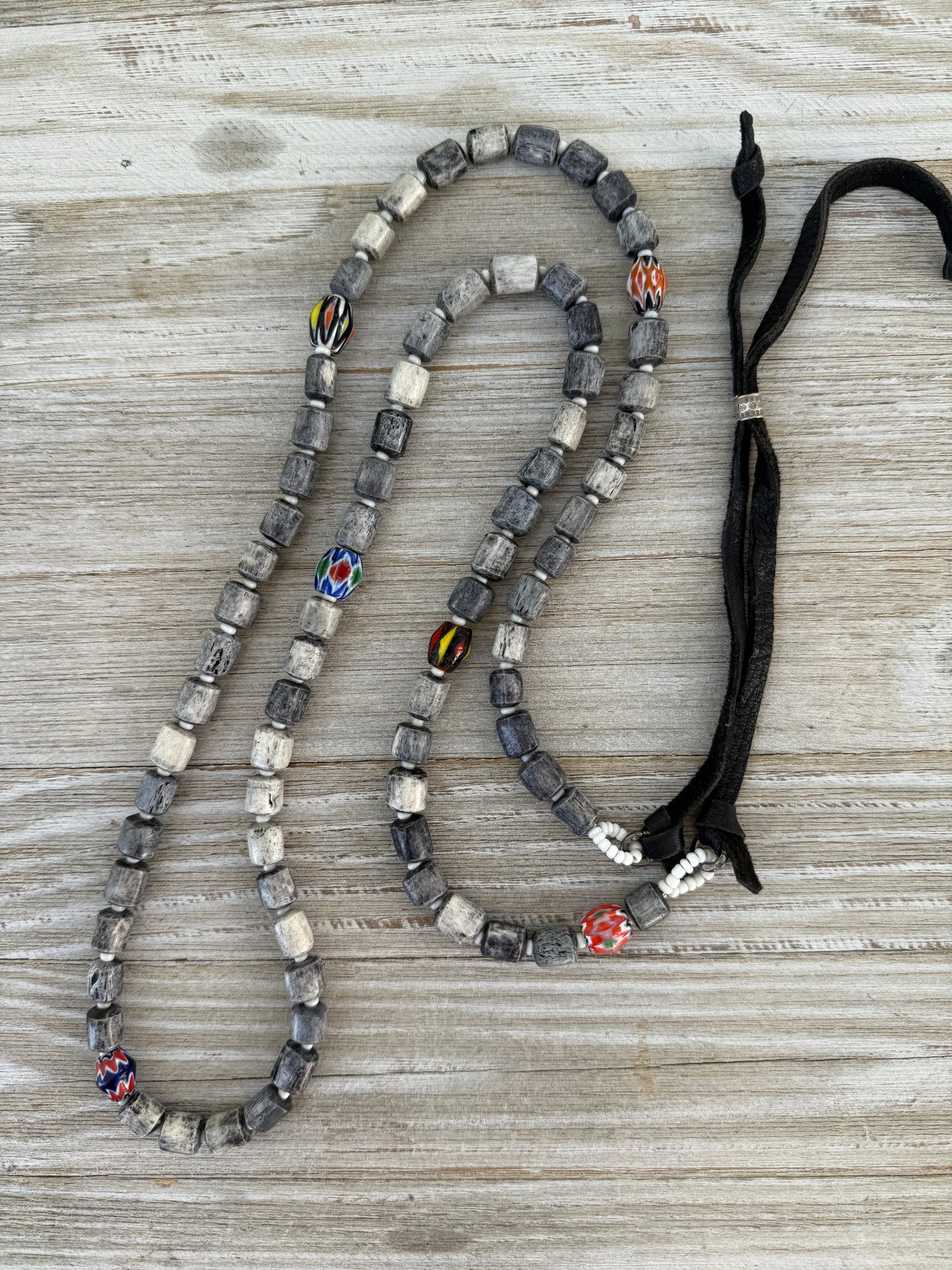 Dark grey barrel beads with colorful trade beads adjustable long necklace.