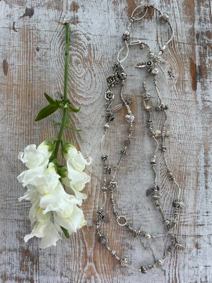 Fine silver extra long flower garden necklace. 47” long.