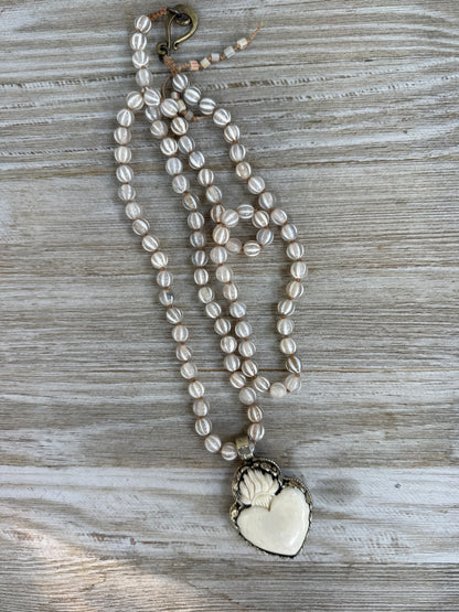 Knotted white striped agate Dzi beads long necklace with removable carved bone Tibetan flaming heart pendant. 35”