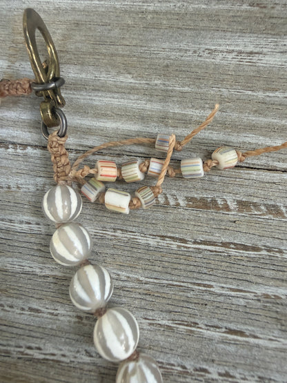 Knotted white striped agate Dzi beads long necklace with removable carved bone Tibetan flaming heart pendant. 35”