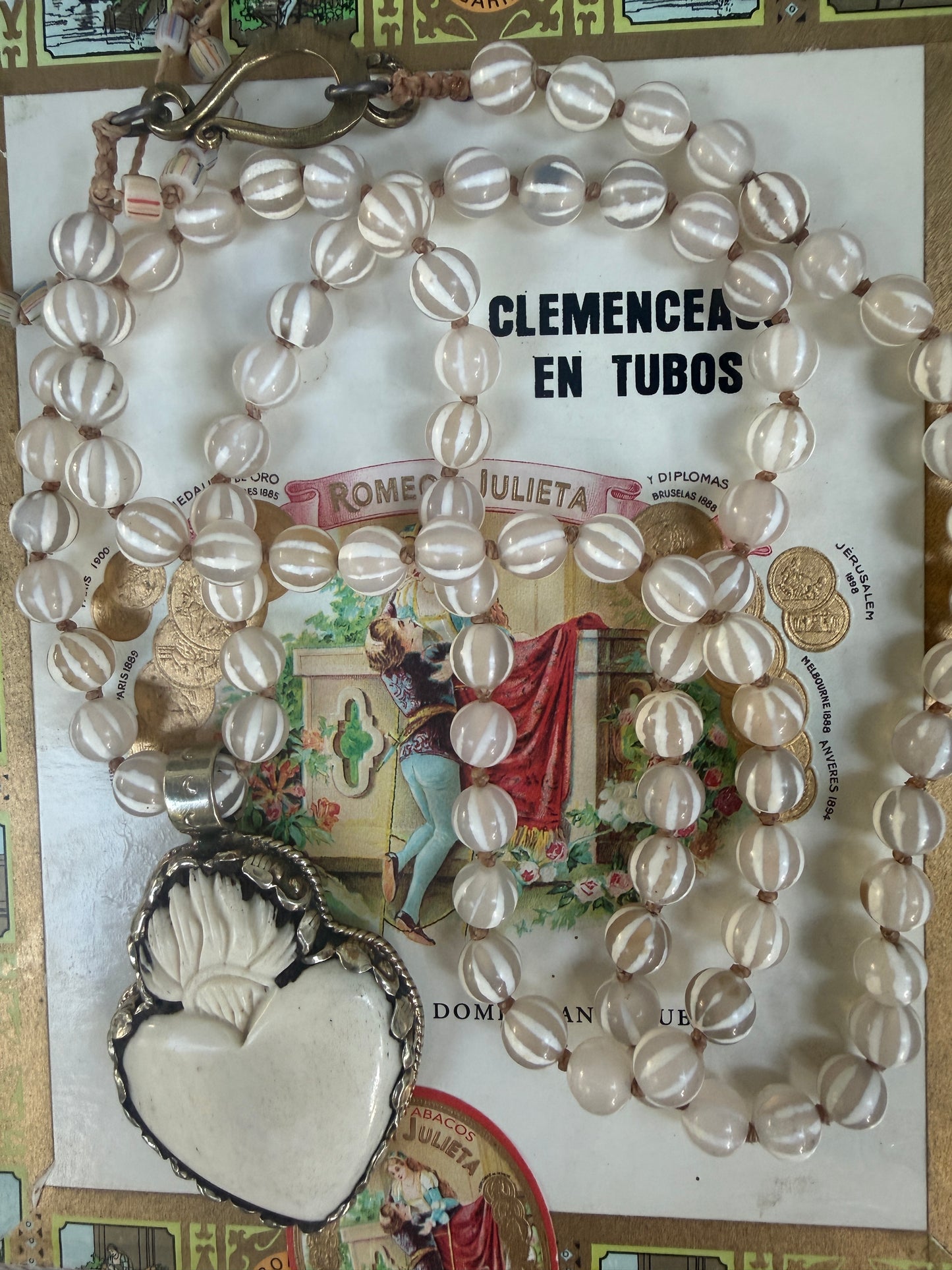 Knotted white striped agate Dzi beads long necklace with removable carved bone Tibetan flaming heart pendant. 35”