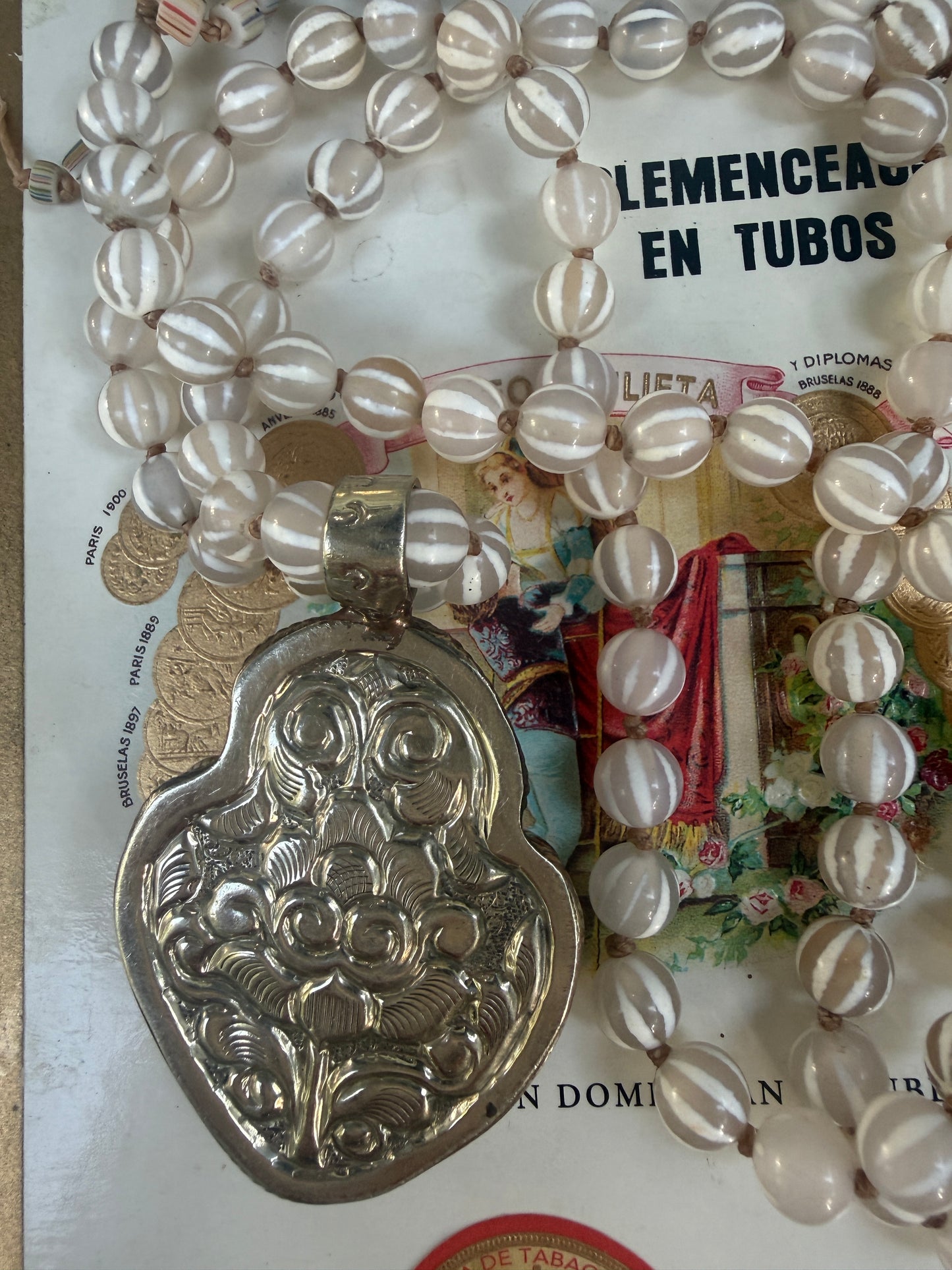 Knotted white striped agate Dzi beads long necklace with removable carved bone Tibetan flaming heart pendant. 35”