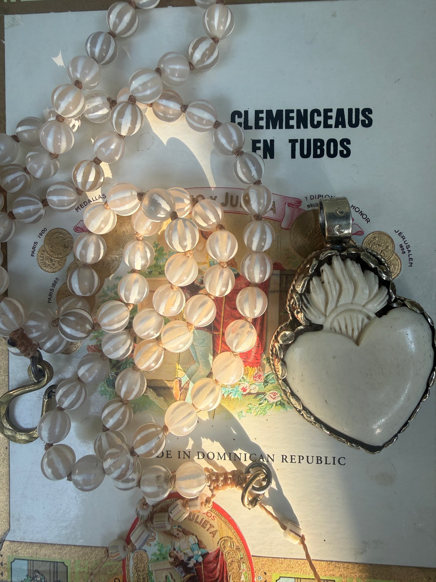 Knotted white striped agate Dzi beads long necklace with removable carved bone Tibetan flaming heart pendant. 35”