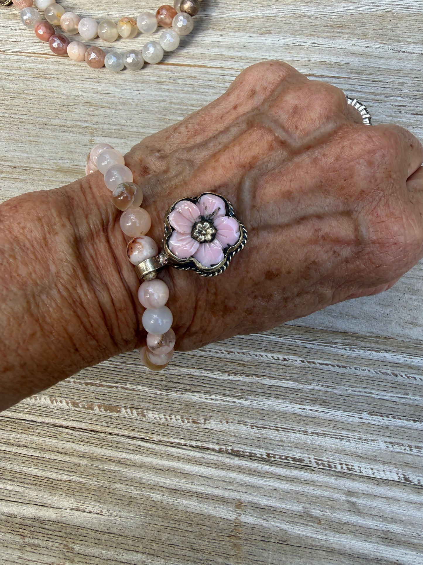 Tibetan pink Opal carved flower on cherry blossom agate stretch bracelet. 7”.