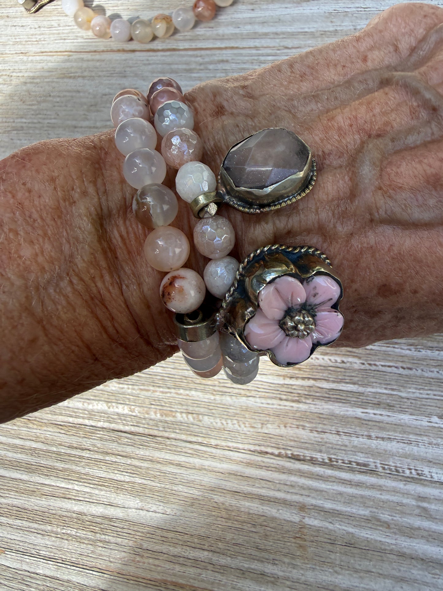 Tibetan pink Opal carved flower on cherry blossom agate stretch bracelet. 7”.