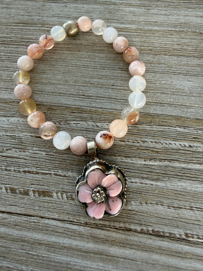 Tibetan pink Opal carved flower on cherry blossom agate stretch bracelet. 7”.