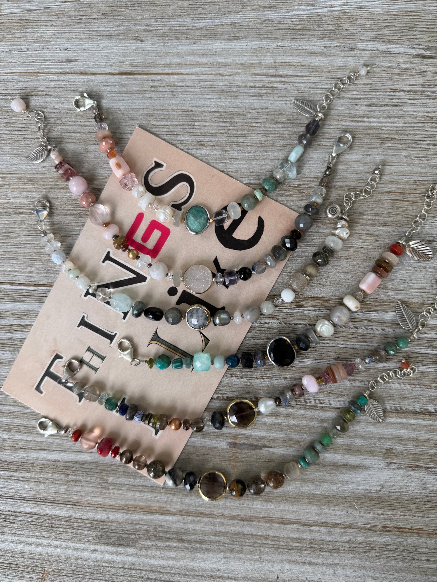 Assorted gemstones with smoky quartz focal bracelet. Sterling clasp and extender chain. 7-8.25”