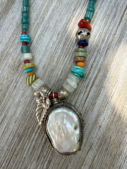 Pearl pendant on trade beads, moonstone, turquoise, coral, and fine silver accents necklace. 17.5”