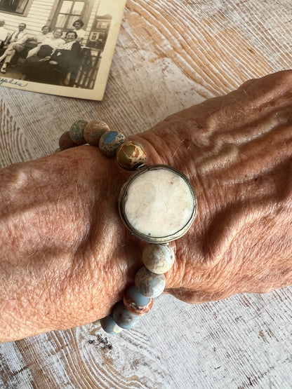 Blue sea sediment Jasper surround a Tibetan bone bead 6.5” stacker bracelet.