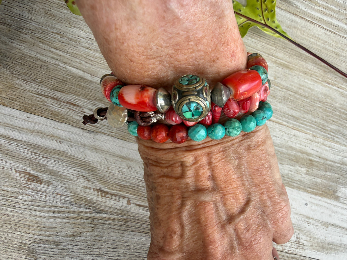 Simplicity in turquoise, fine silver, and broom coral with one trade bead. Stretch bracelet. 6.5”