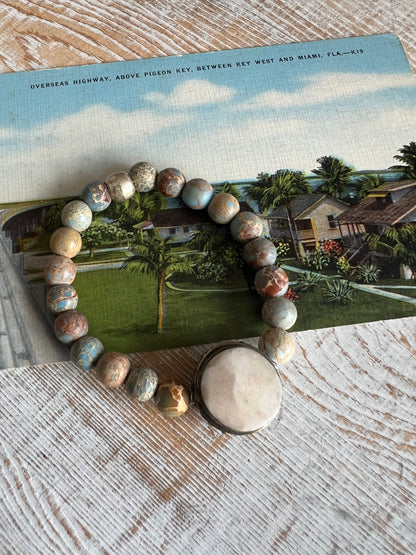 Blue sea sediment Jasper surround a Tibetan bone bead 6.5” stacker bracelet.