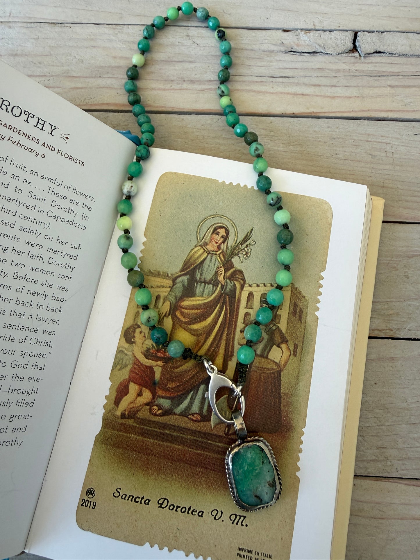 Knotted chrysocolla with sterling silver charm holder clasp and chrysocolla pendant necklace. 17”