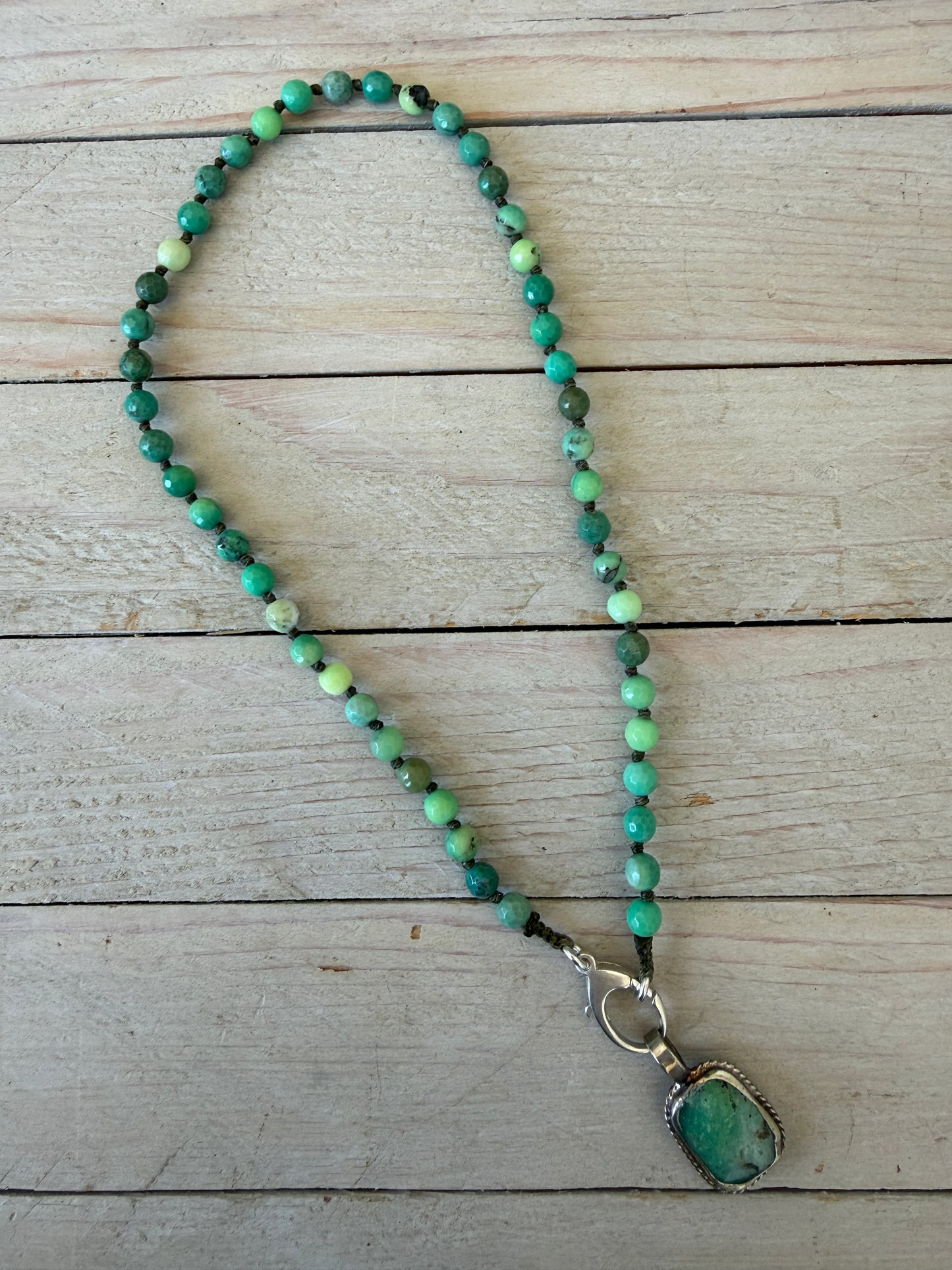 Knotted chrysocolla with sterling silver charm holder clasp and chrysocolla pendant necklace. 17”