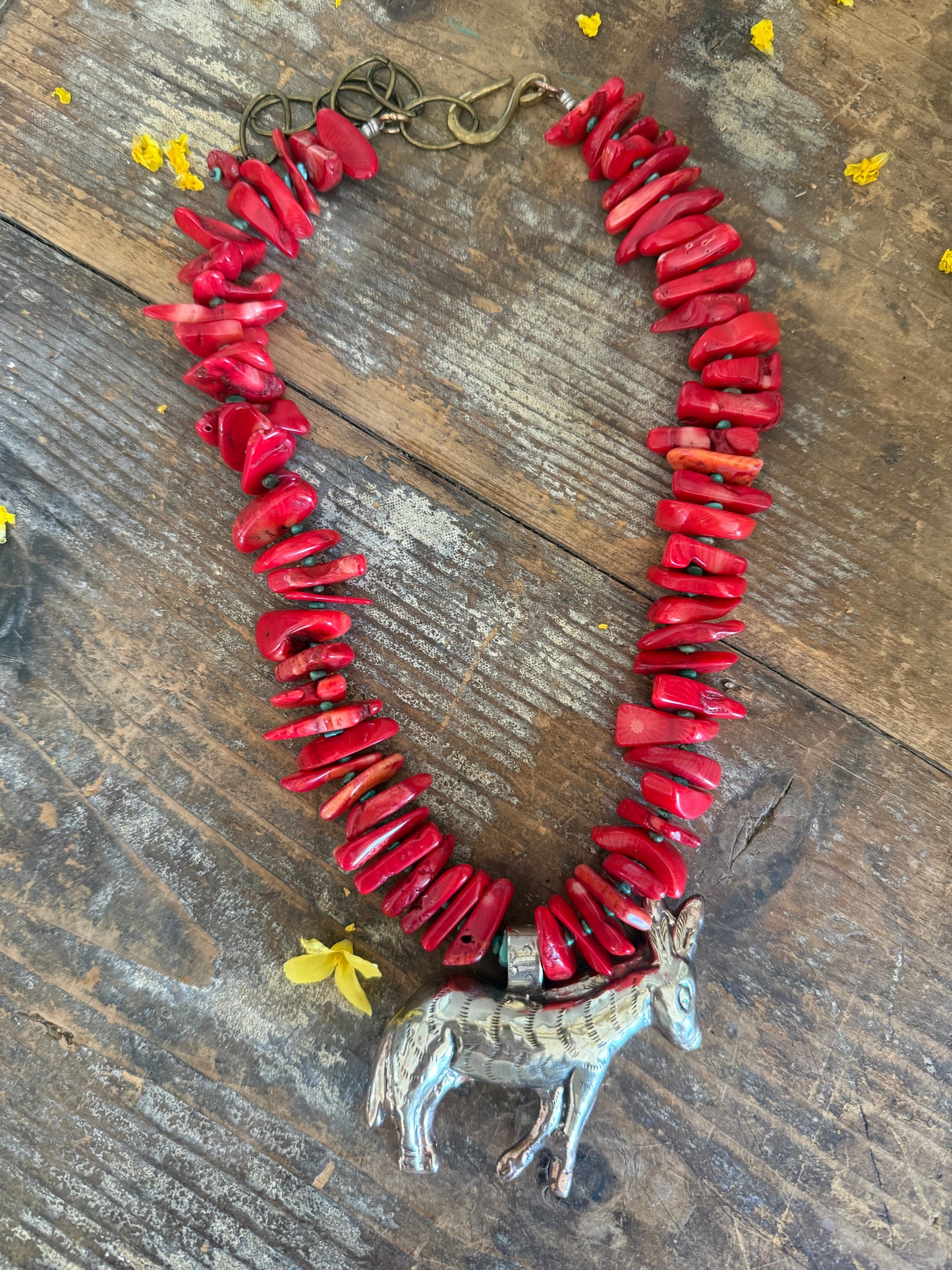 Fun red broom coral and turquoise necklace with donkey pendant. 18.5-23”