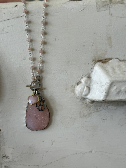 Pink druzie on rose quartz chain. Sterling peace sign and opal heart charm necklace.