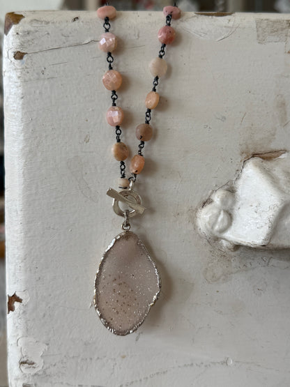 Pale pink druzie on pink Peruvian Opal wire-wrapped coins. Front fine silver toggle necklace.