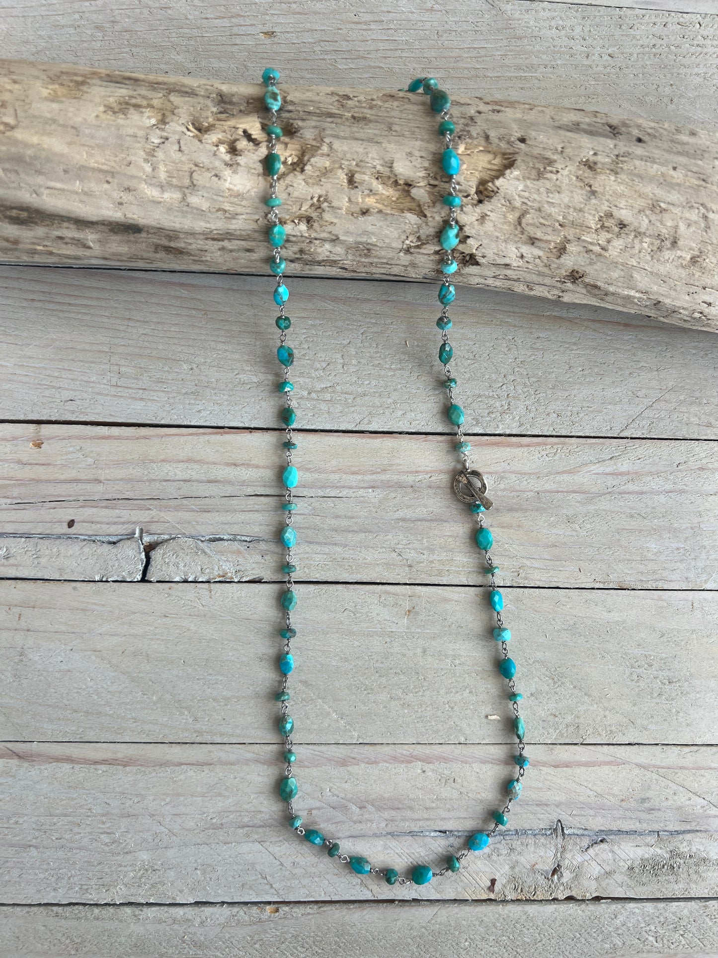 Delicate turquoise chain with toggle clasp. 32” long.