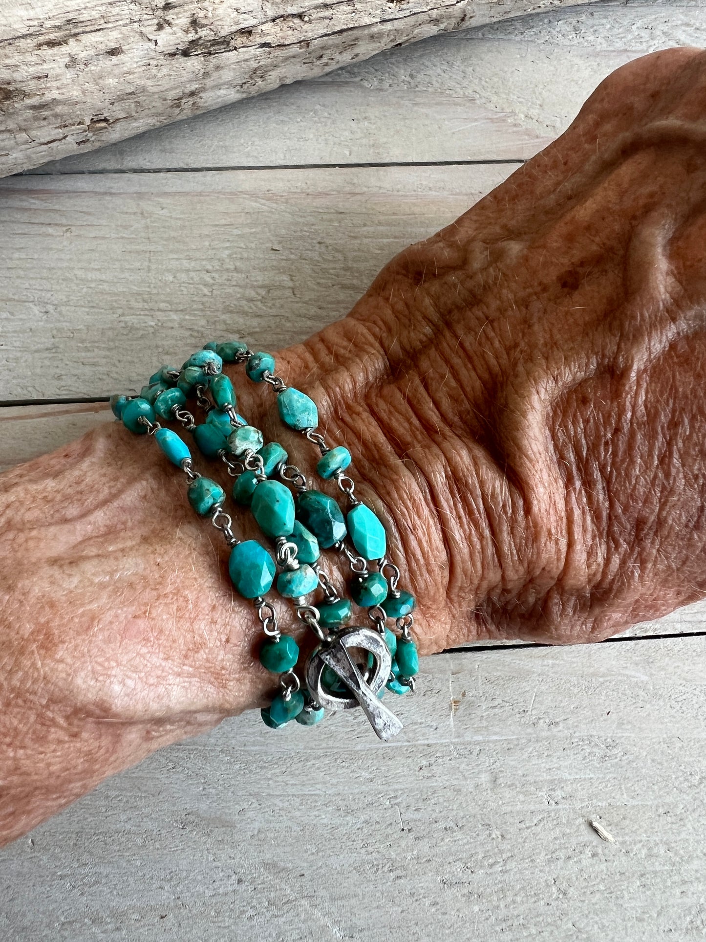 Delicate turquoise chain with toggle clasp. 32” long.