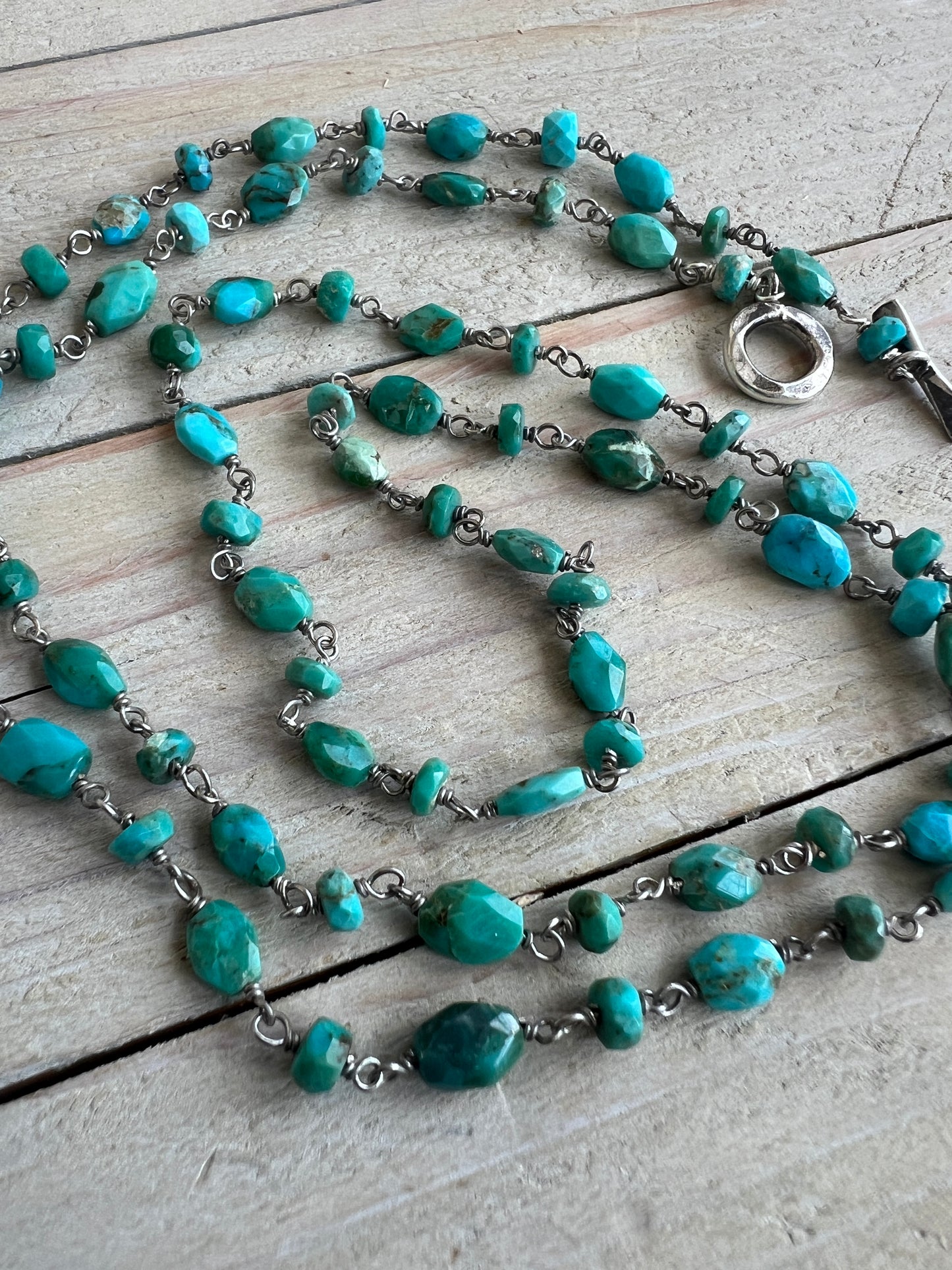 Delicate turquoise chain with toggle clasp. 32” long.