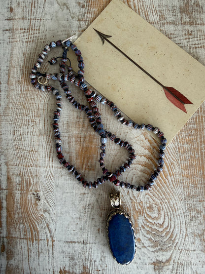 Lapis lazuli pendant (Tibet) with hand knotted blue terracotta chevron beads long necklace.