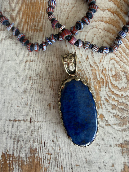 Lapis lazuli pendant (Tibet) with hand knotted blue terracotta chevron beads long necklace.