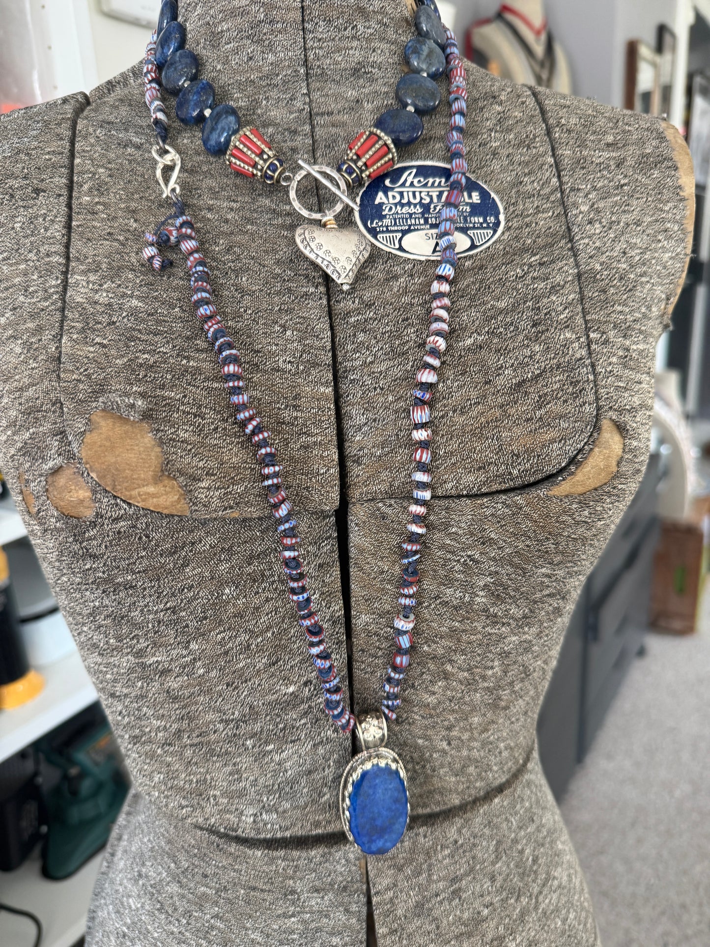 Lapis lazuli pendant (Tibet) with hand knotted blue terracotta chevron beads long necklace.