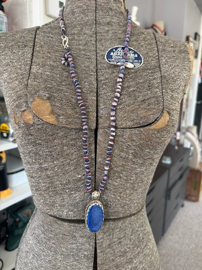 Lapis lazuli pendant (Tibet) with hand knotted blue terracotta chevron beads long necklace.
