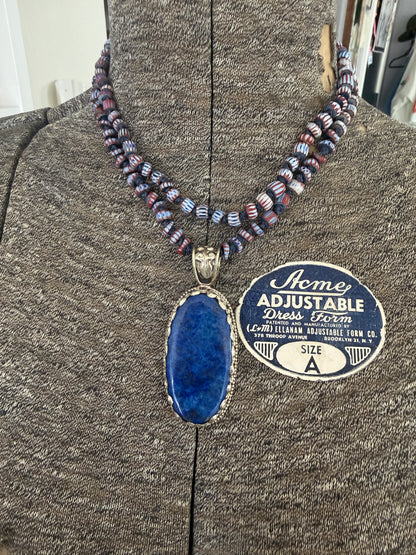Lapis lazuli pendant (Tibet) with hand knotted blue terracotta chevron beads long necklace.