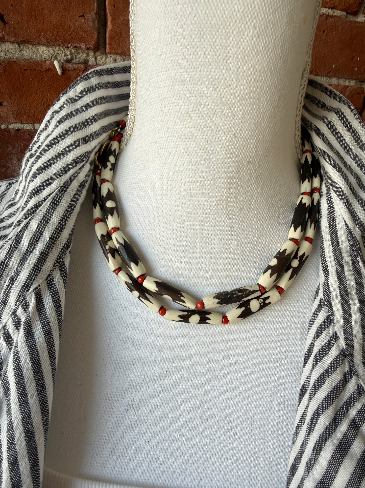 Bone cross with flowers pendant (removable) on African bone beads long necklace. 36”