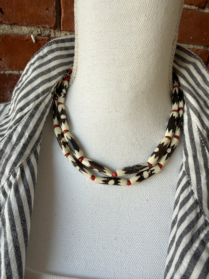 Bone cross with flowers pendant (removable) on African bone beads long necklace. 36”
