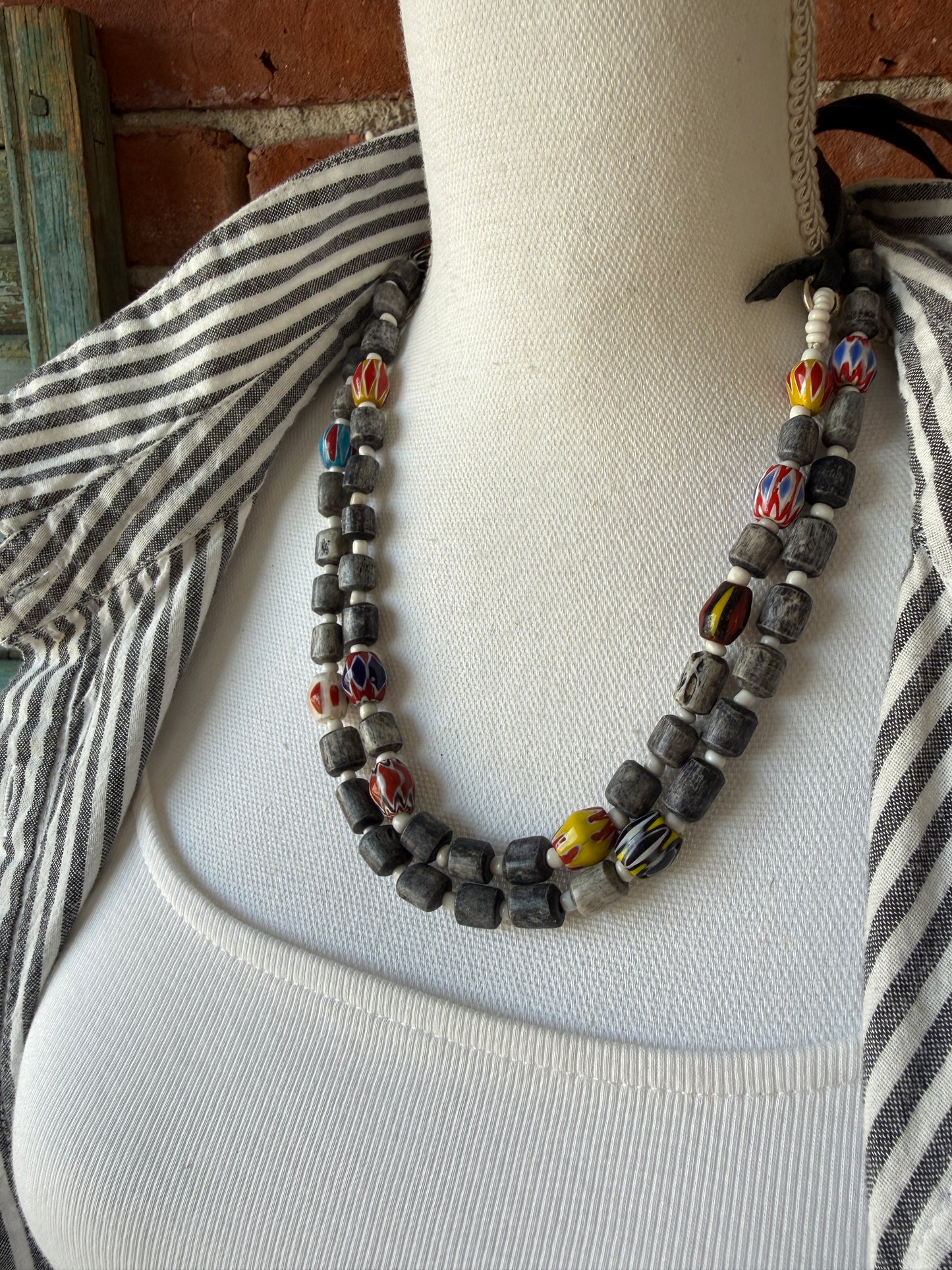 Midnight bone beads with African chevron beads extra long adjustable necklace on leather. 58”