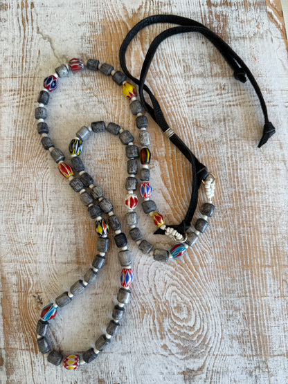 Midnight bone beads with African chevron beads extra long adjustable necklace on leather. 58”