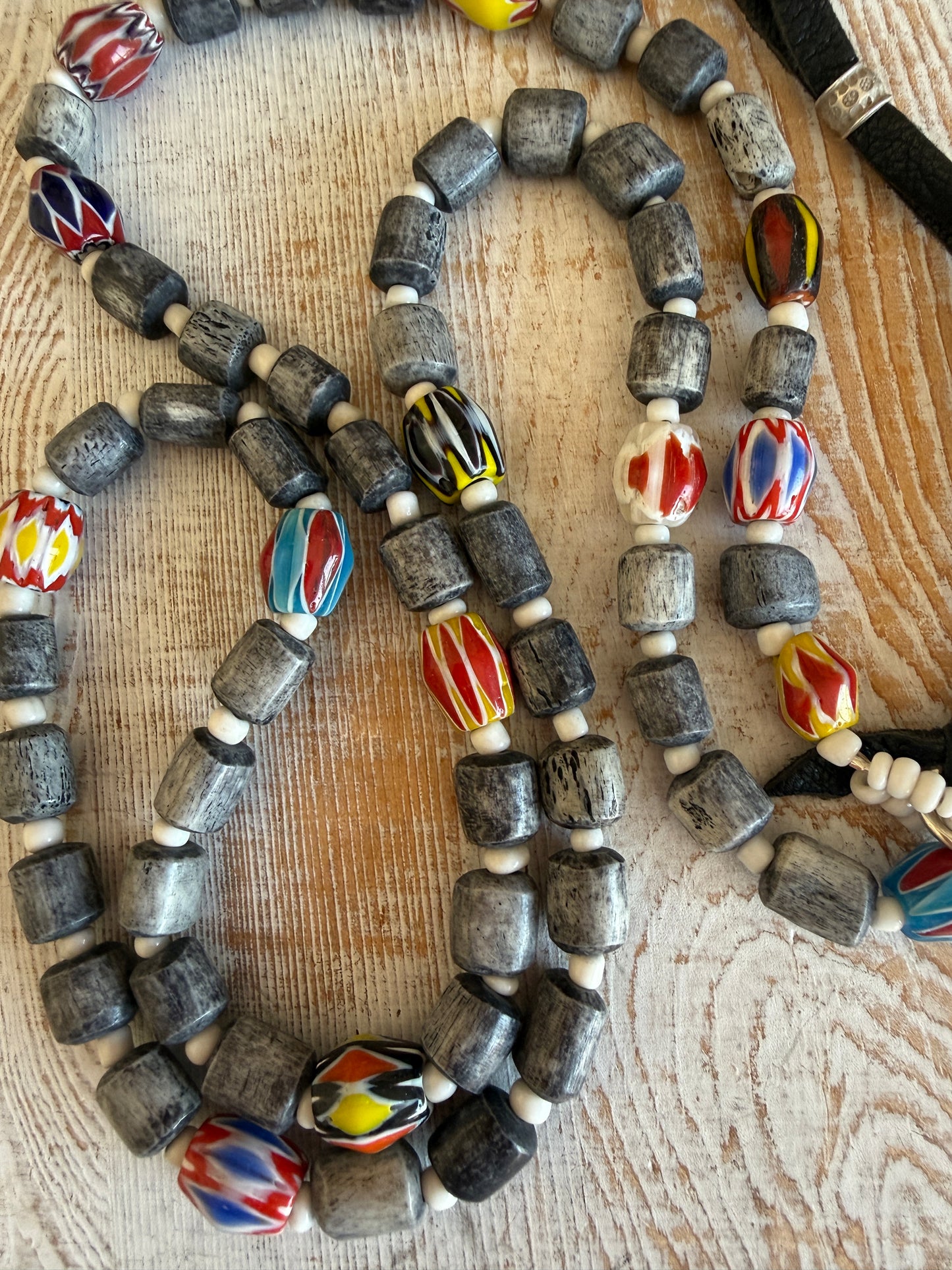 Midnight bone beads with African chevron beads extra long adjustable necklace on leather. 58”