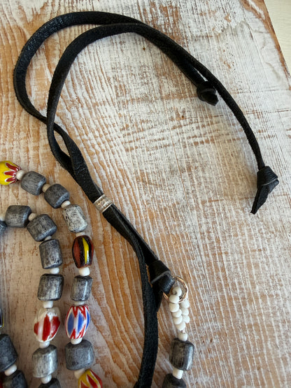 Midnight bone beads with African chevron beads extra long adjustable necklace on leather. 58”
