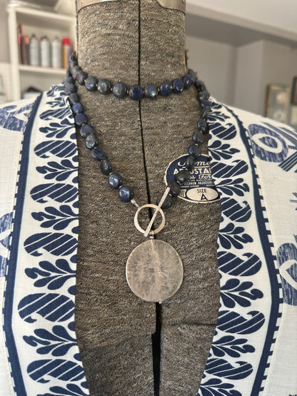 Blue lapis lazuli coins with fine silver front toggle and large textured coin pendant necklace.