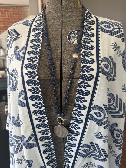 Blue lapis lazuli coins with fine silver front toggle and large textured coin pendant necklace.