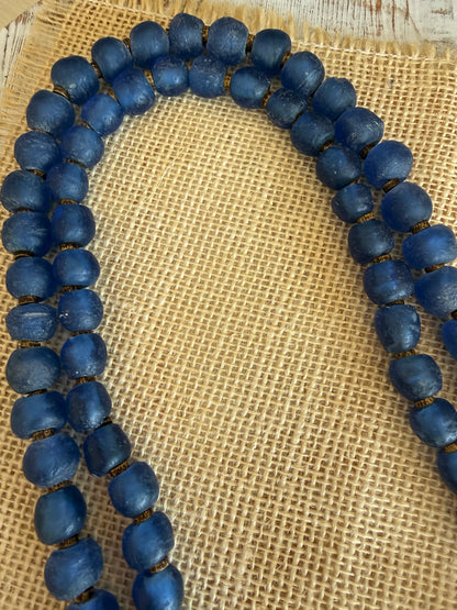 Blue Krobo glass beads with wood chain necklace.
