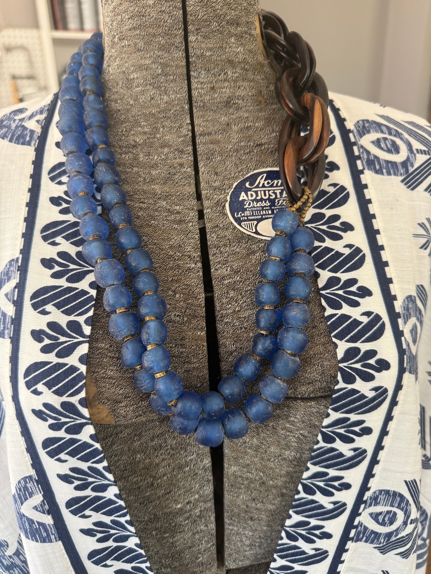 Blue Krobo glass beads with wood chain necklace.