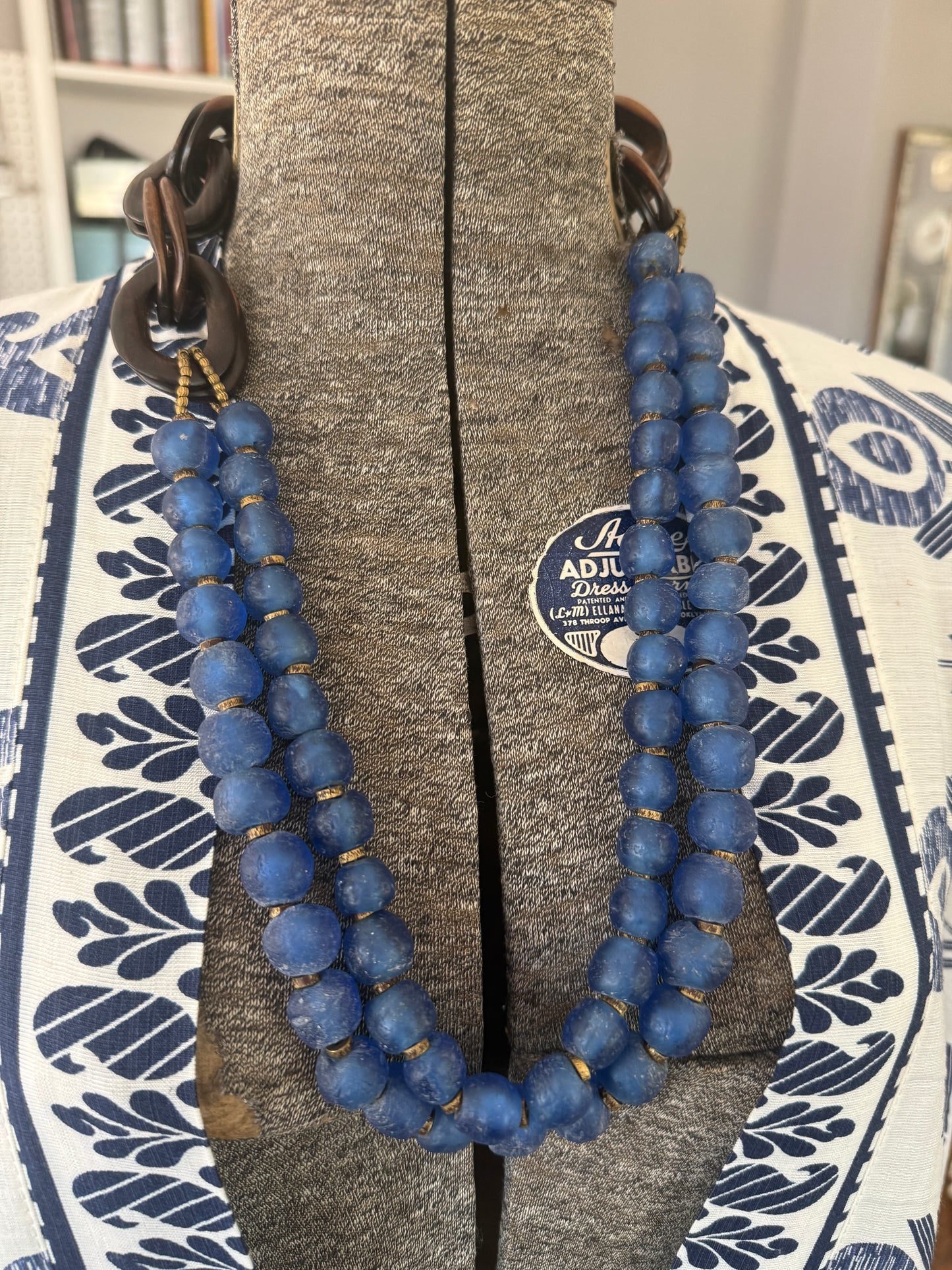 Blue Krobo glass beads with wood chain necklace.