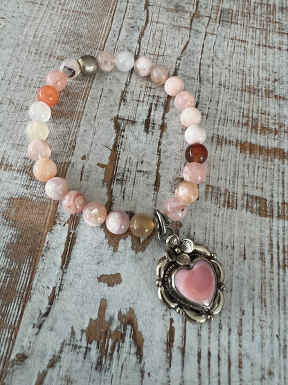 Tibetan silver Peruvian Opal heart charm on cherry blossom agates. Stretch stack bracelet. 7”.