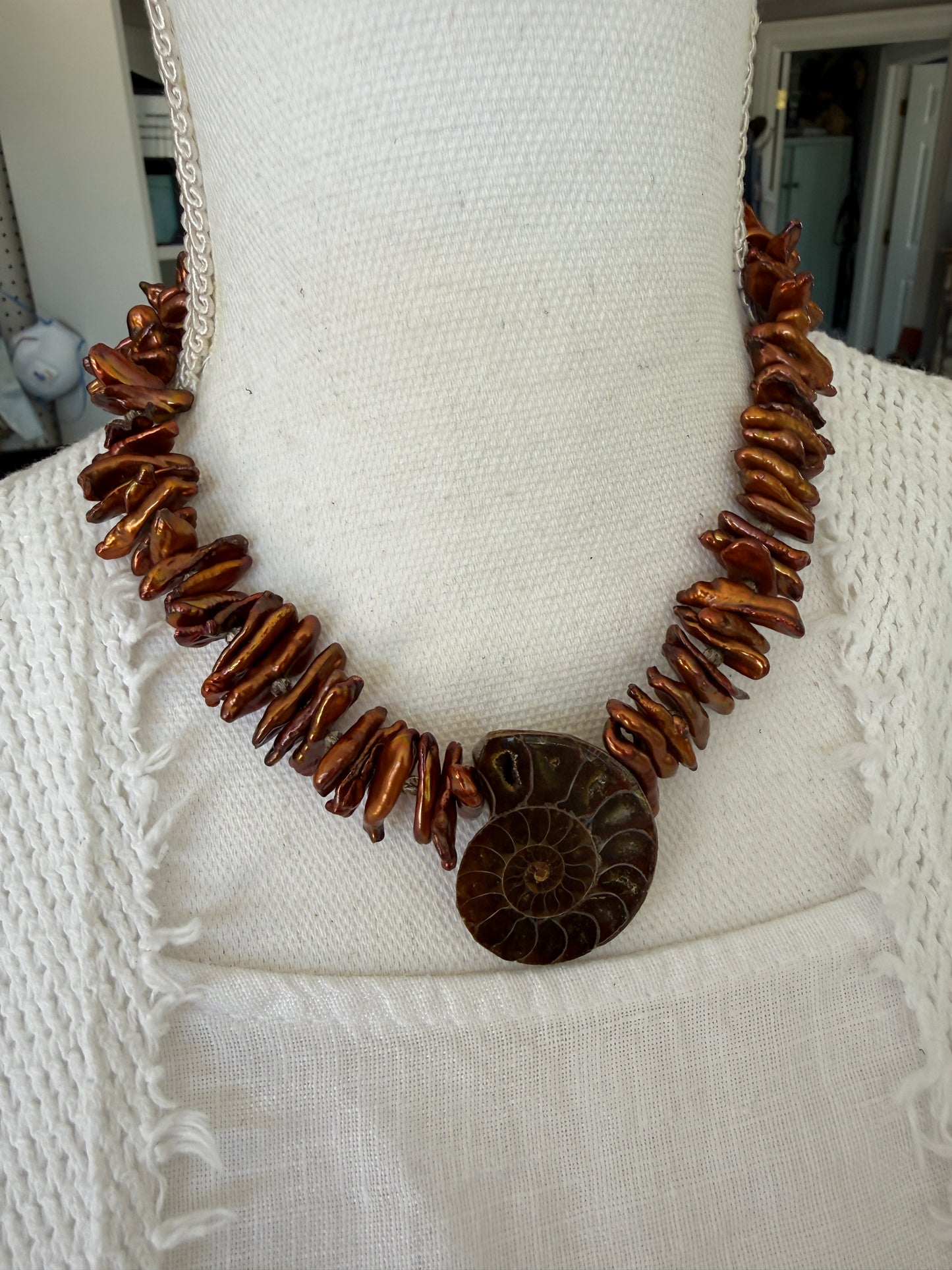 Brown stick pearls with smoky quartz and natural ammonite pendant necklace.