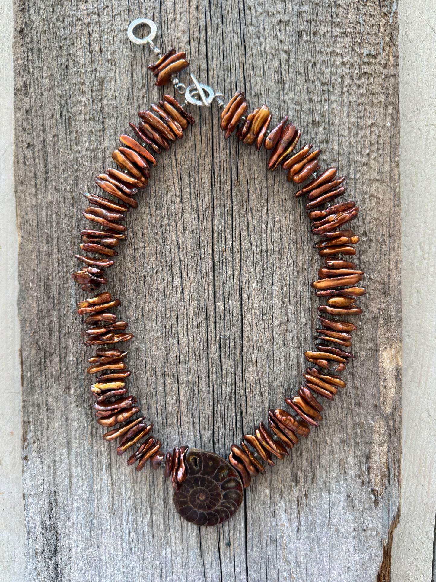 Brown stick pearls with smoky quartz and natural ammonite pendant necklace.
