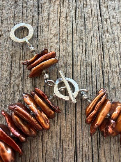 Brown stick pearls with smoky quartz and natural ammonite pendant necklace.