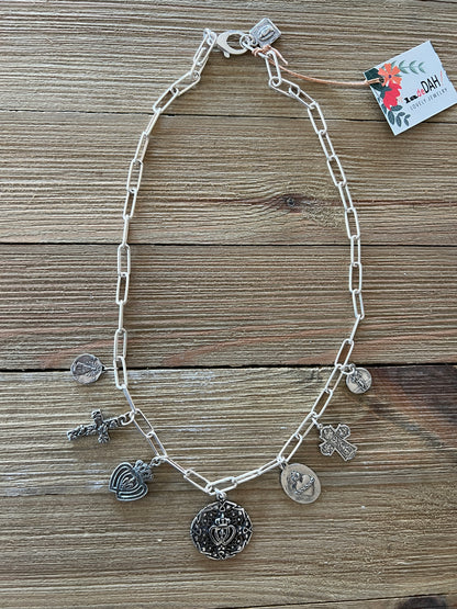 Aged sterling silver heart, cross, and saints medals on paperclip chain, sterling silver necklace. Adjustable to 18.5”.