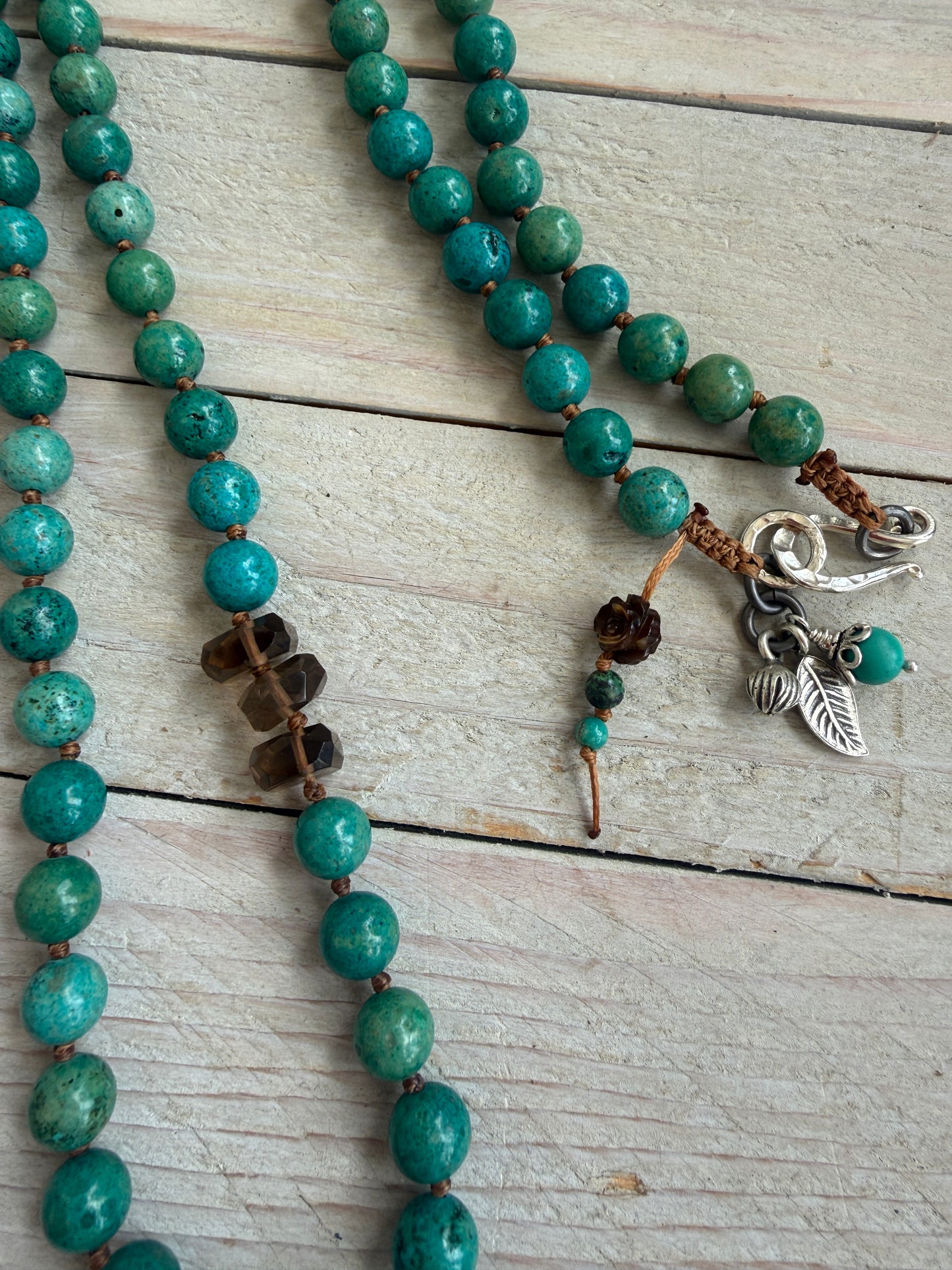 Turquoise cactus pendant necklace on knotted turquoise with smoky quartz and fine silver accents.
