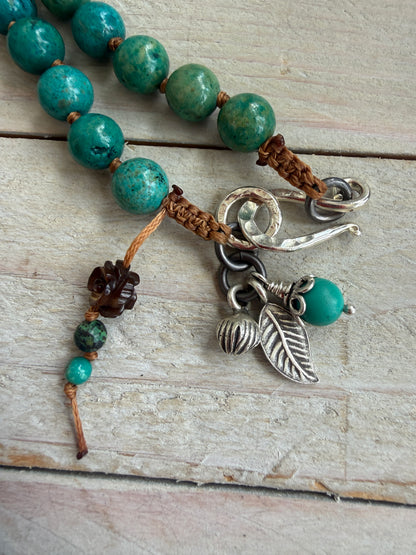 Turquoise cactus pendant necklace on knotted turquoise with smoky quartz and fine silver accents.