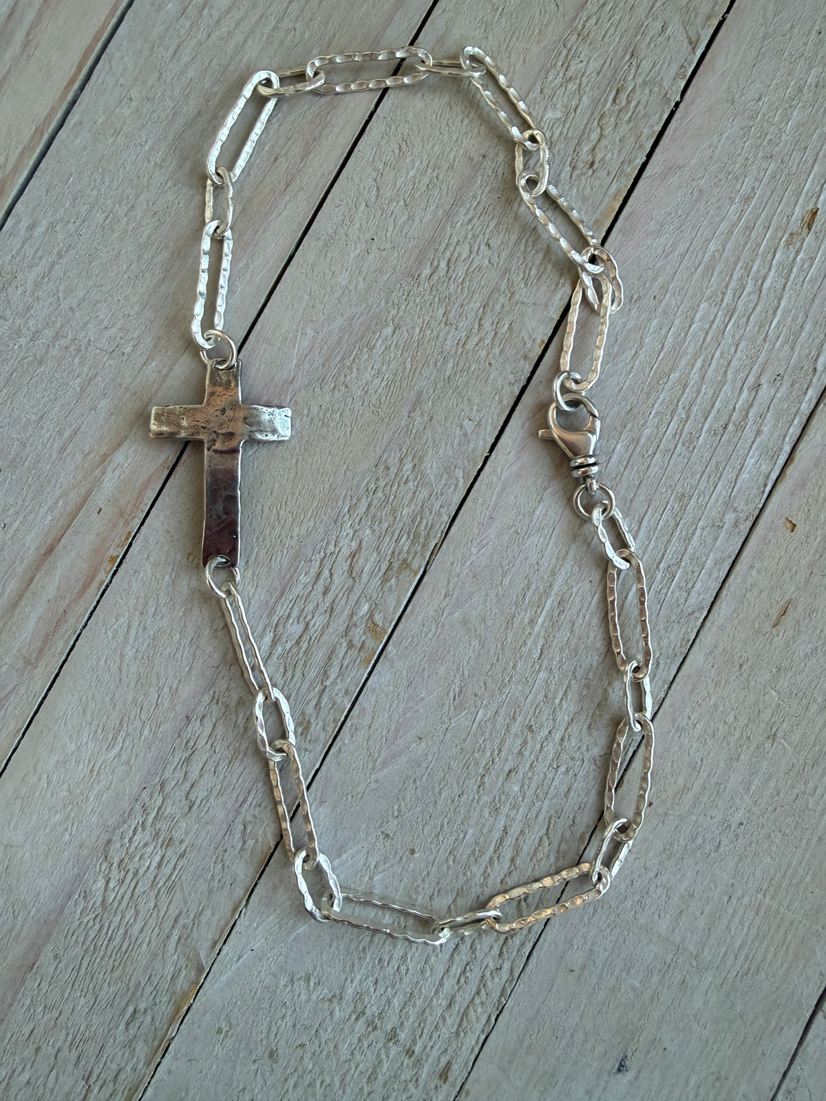 Hammered sterling cross on hammered fine silver paperclip chain short necklace. 17”.