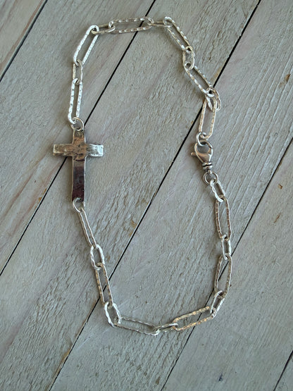 Hammered sterling cross on hammered fine silver paperclip chain short necklace. 17”.