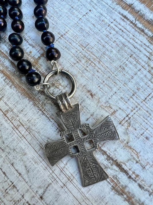 Hand-knotted midnight blue pearls with antique sterling cross